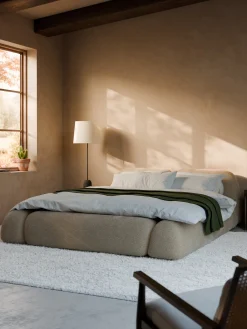 Letto imbottito con contenitore Wolke